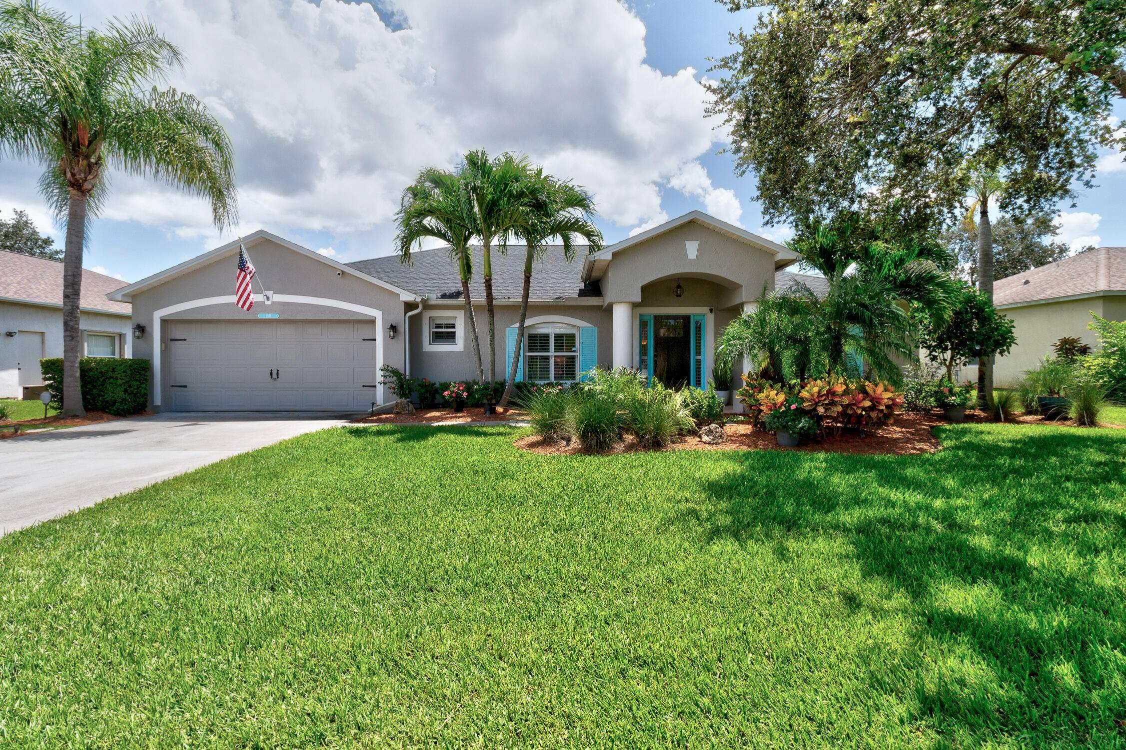 EXPERIENCE PARADISE in this updated, move in ready 3 2 2 POOL home.