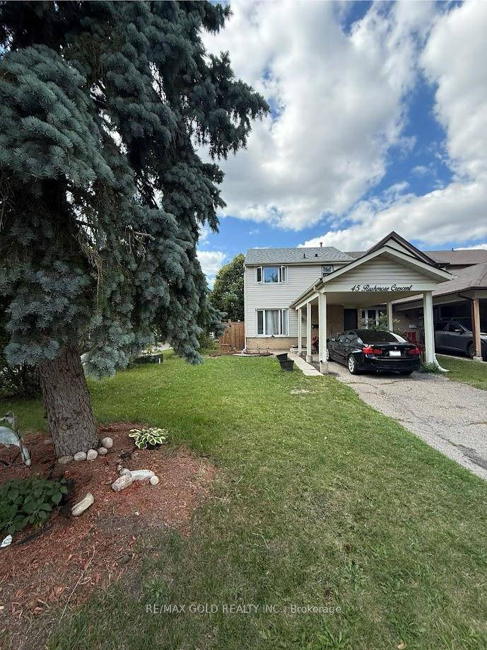 Absolutely stunning corner townhome in the sought after Heart Lake community !