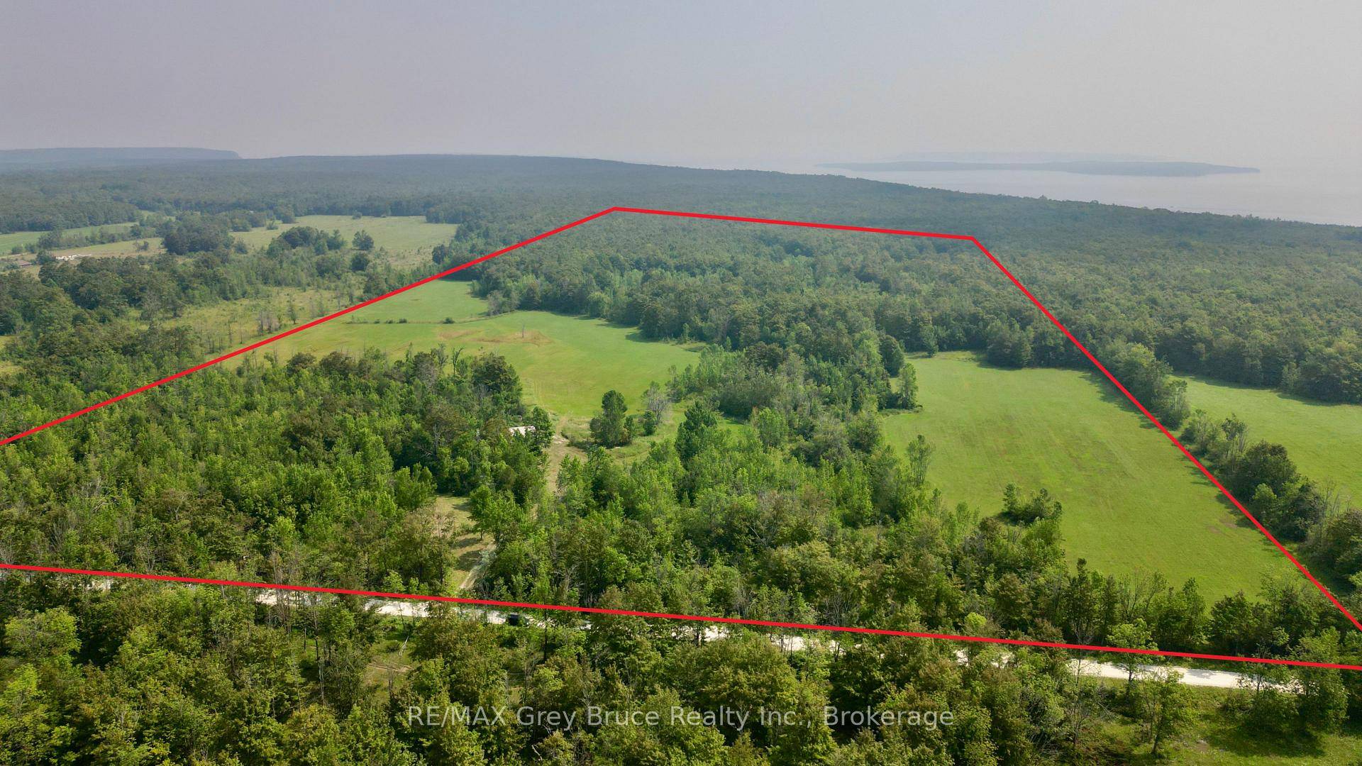 Situated on a quiet No Exit year round road, you'll find this beautiful 99 acres of land in Purple Valley !