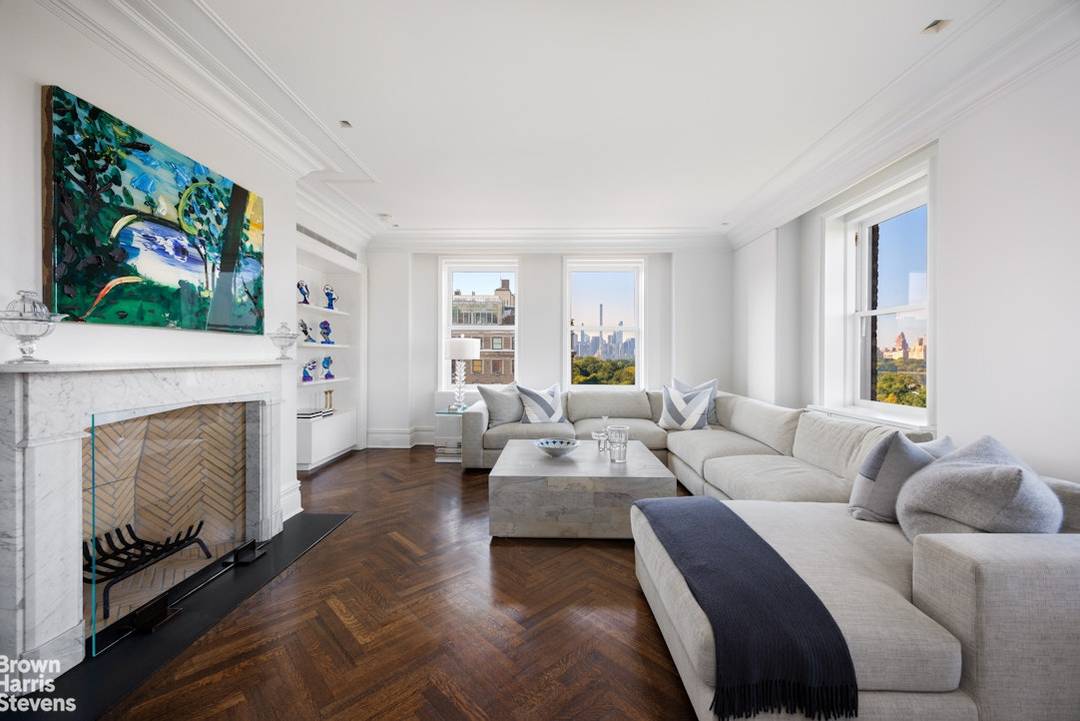 Located on Fifth Avenue's Museum Mile, this penthouse duplex boasts panoramic views of Central Park, the reservoir, and dramatic skyline views to Midtown Manhattan and beyond !