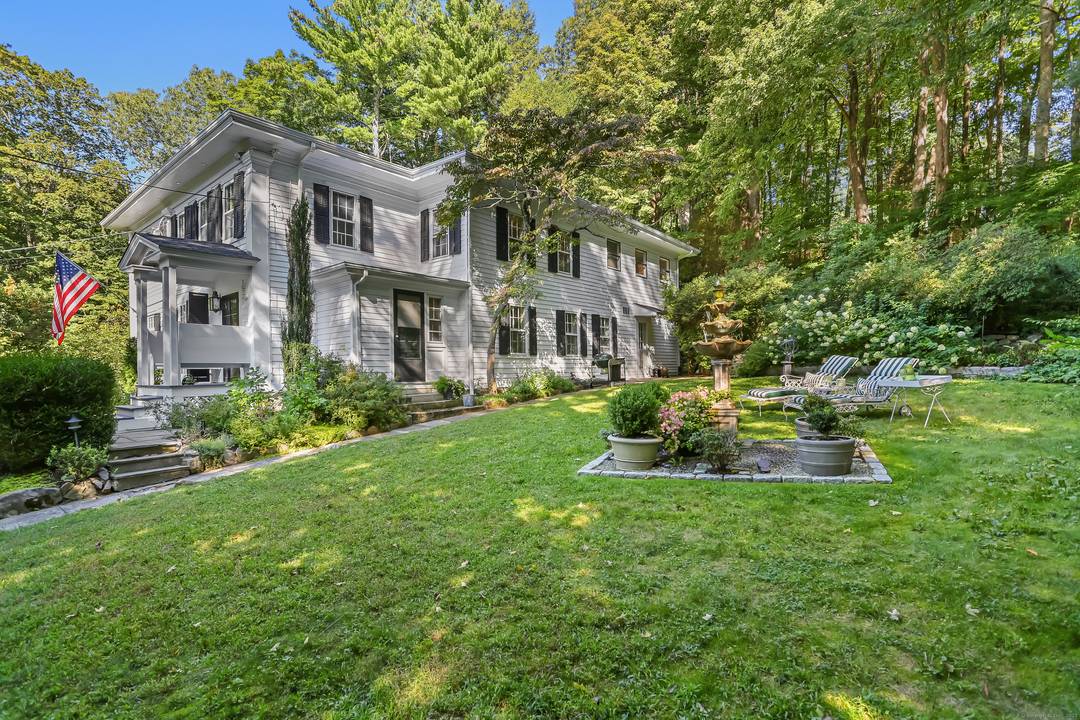 Historic Elegance meets today's lifestyle in this 1845 Antique w 145' of scenic river frontage but not in the flood zone, in Lower Weston.