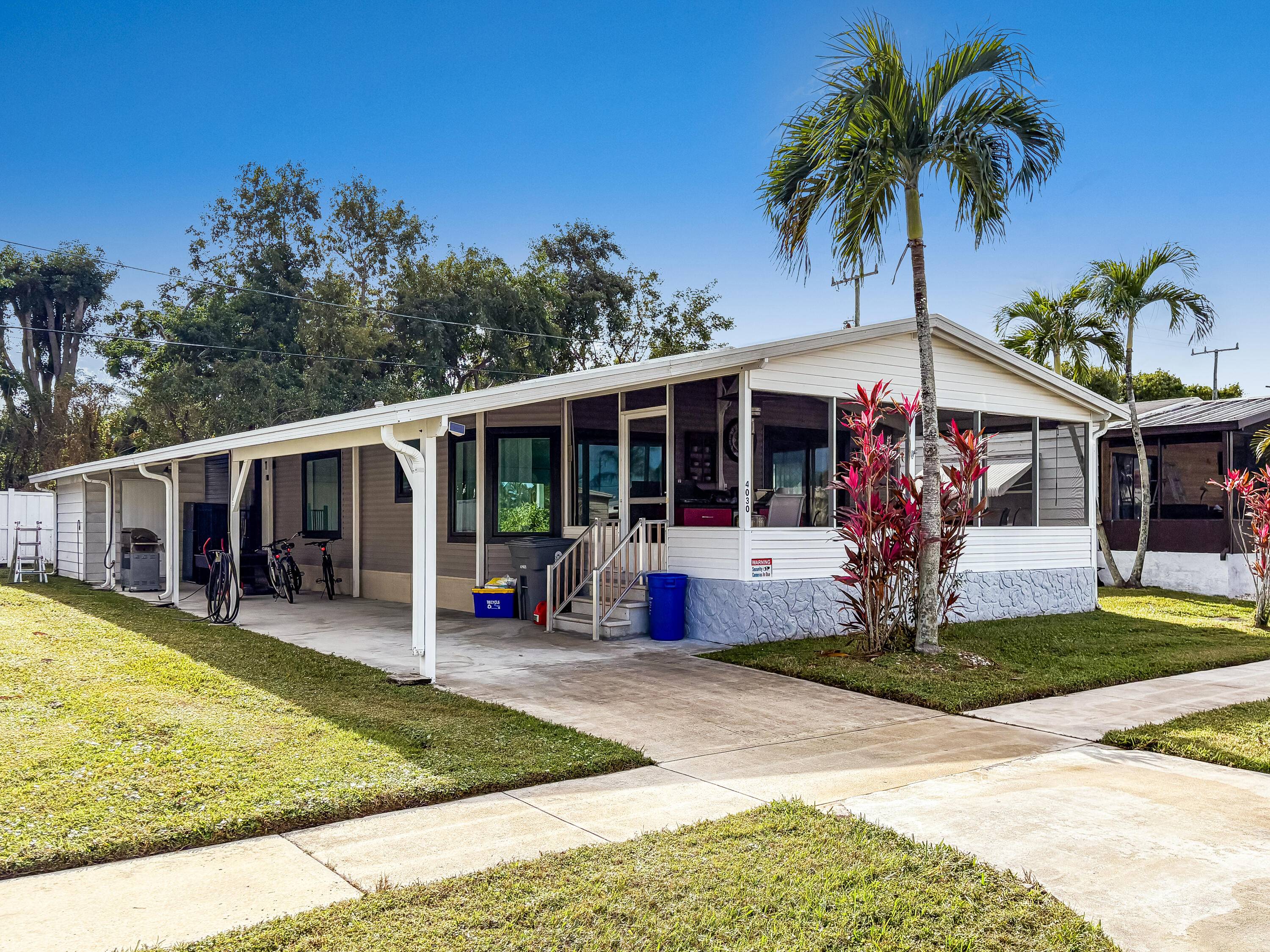 You Own the Land directly Welcome to this beautifully maintained 3 bedroom, 2 bathroom mobile home, ideally located in the heart of Boynton Beach !