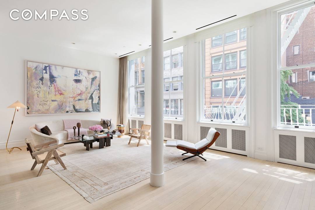 In the heart of Soho, this spectacular turn key home offers the best of loft living.