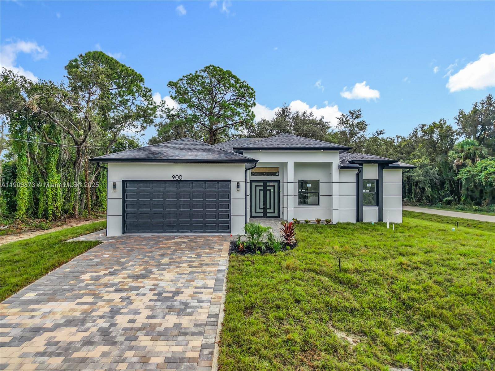 Brand new construction 2025 on a HALF ACRE LOT in Lehigh Acres.