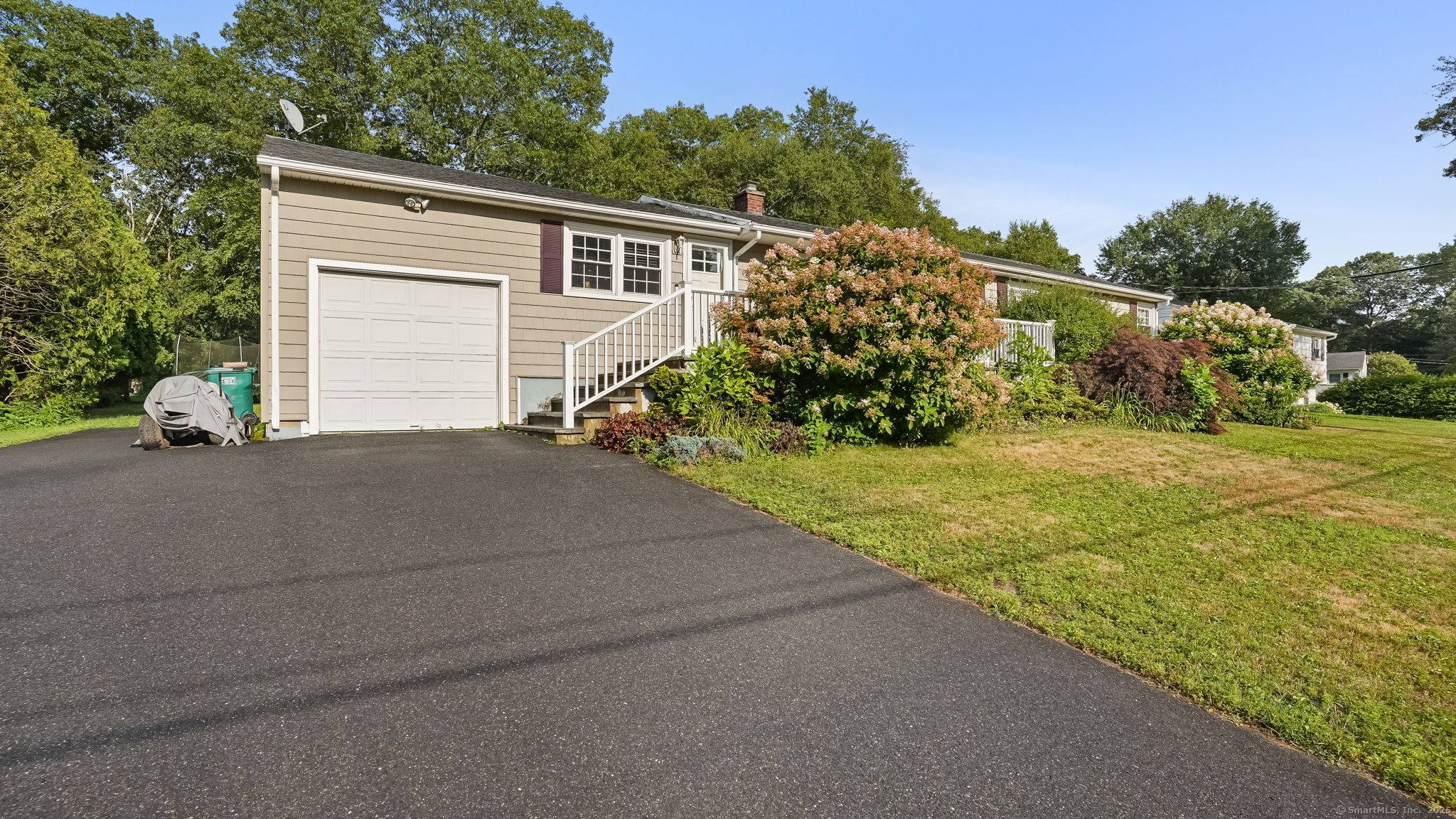 Welcome to this charming custom ranch style home offering space, versatility, and comfort on a beautiful half acre of level land.