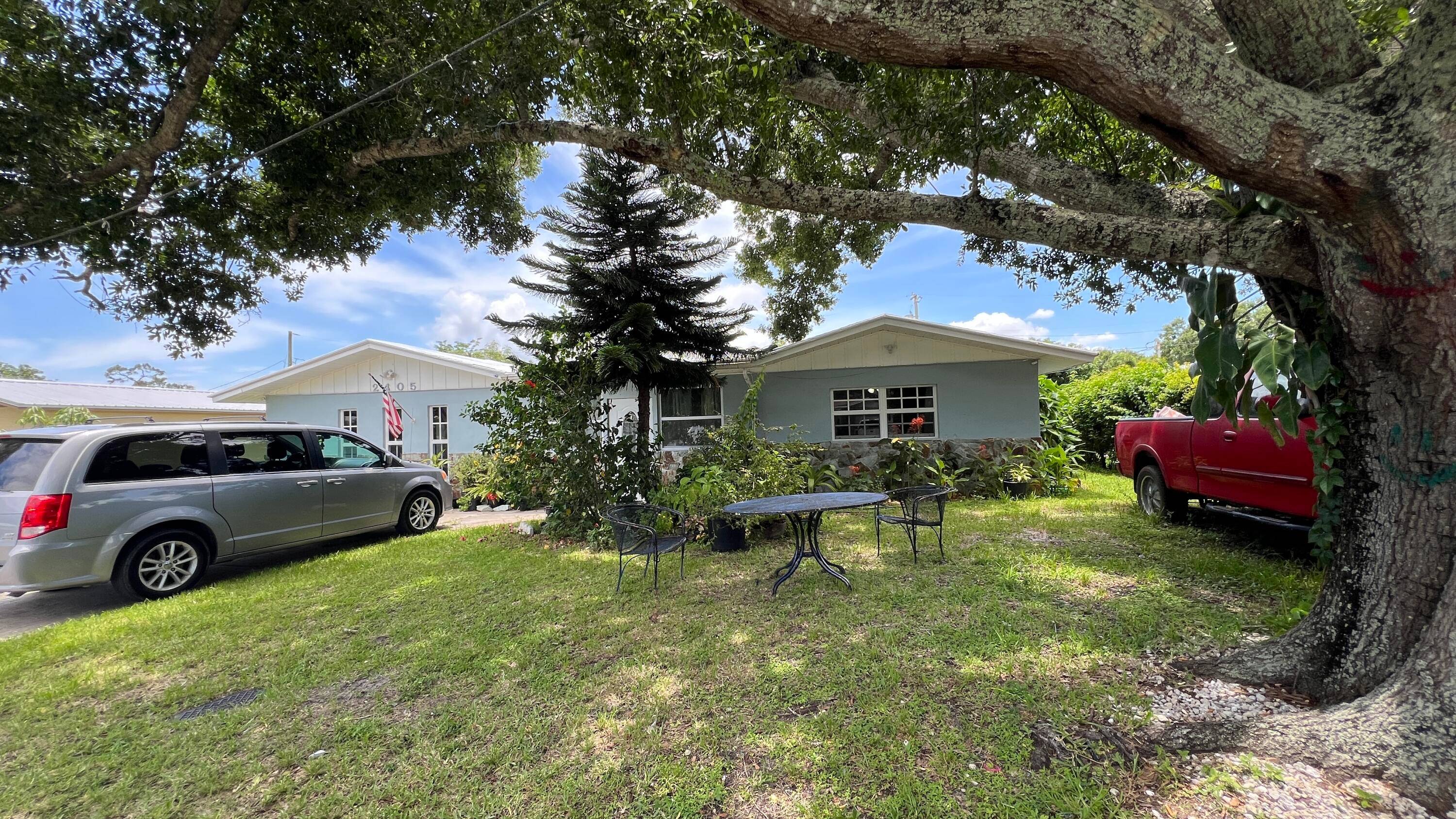 As is spacious home featuring 3 bedrooms and 2 bathrooms, including a guest bath with dual sinks perfect for families or guests.