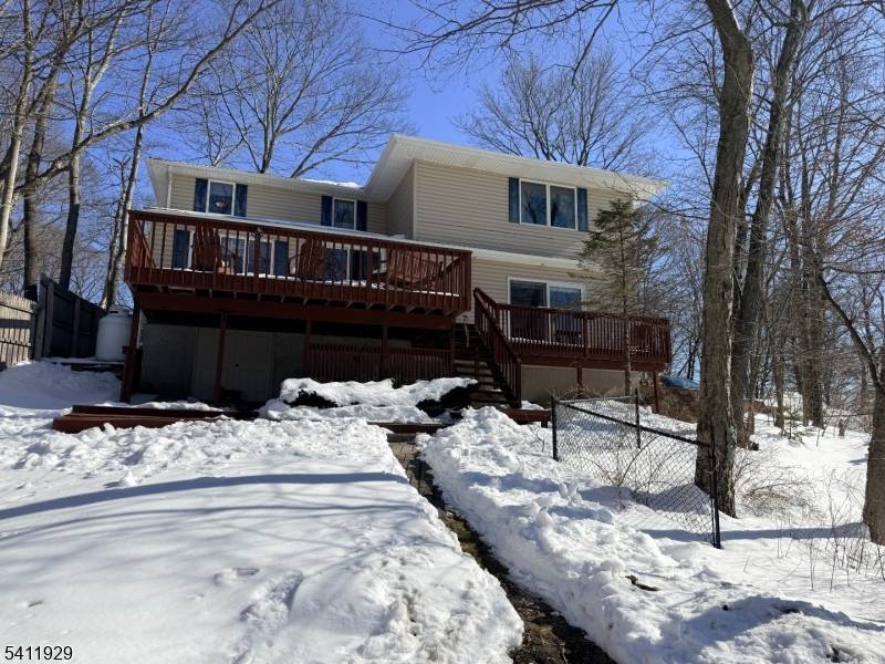 Spectacular Lake Views from nearly every angle in this beautifully positioned home in Upper Greenwood Lake.