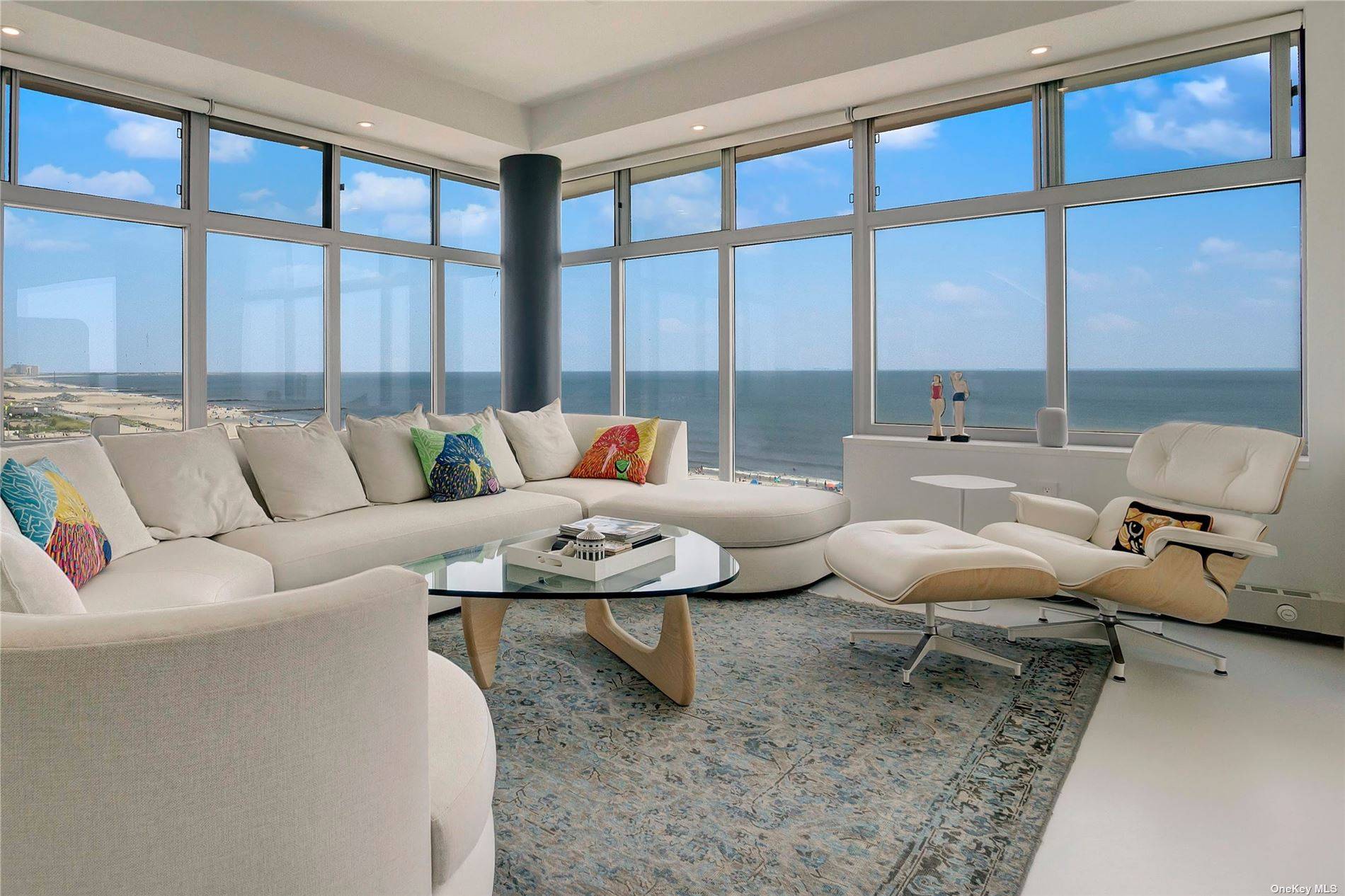 Indulge in luxury living in this meticulously remodeled oceanfront home featuring sweeping ocean views and a private terrace.
