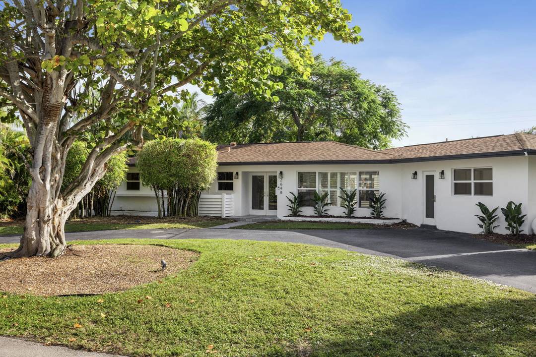 Nestled within the city's most sought after school district, this move in ready gem boasts an unparalleled location on one of the most private quiet streets in Coral Ridge.
