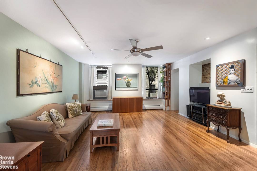 Welcome home to Apartment 1GN at The Schuyler Arms a relaxed and spacious duplex just steps from Riverside Park.