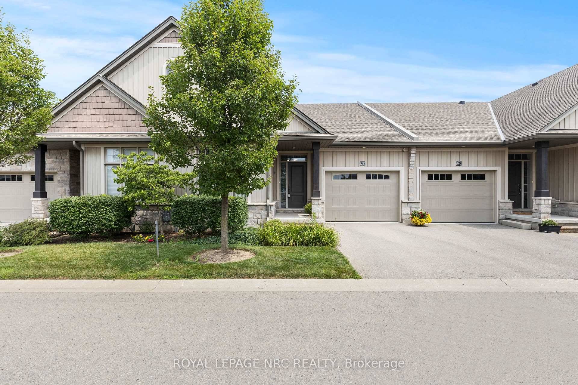 Welcome to 30 Blossom Common, a charming 2 bedroom, 2 bathroom bungalow townhome in the sought after Trillium Gardens community of Port Weller East.