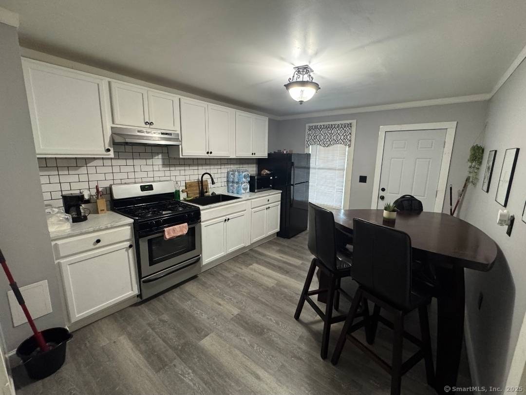 Recently renovated, great income producing 4 family units property.