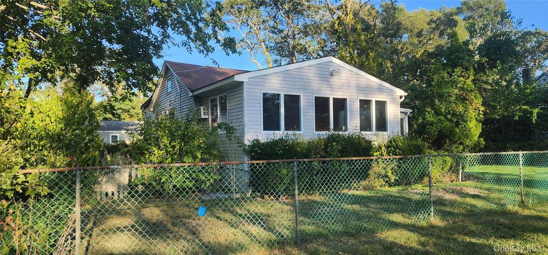 Renovated 3 bedroom home with huge master bedroom, large beautiful fenced in yard on nice quiet block in Mastic Beach !