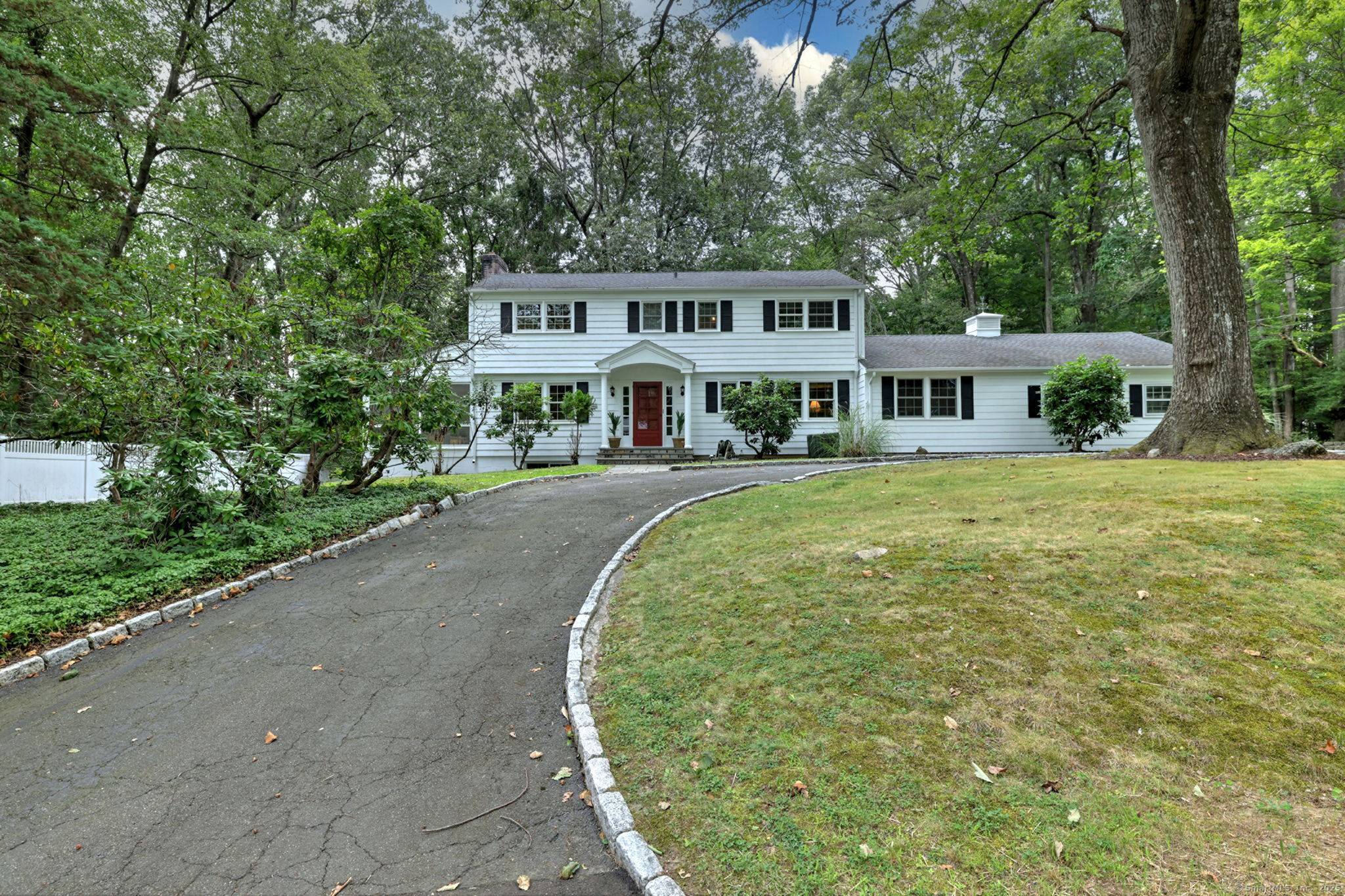 This gracious Colonial on one of North Stamford's most coveted cul de sacs is the home you have been waiting for.