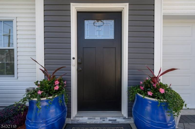 Stunning 4 Bed 3. 5 Bath Turn Key Colonial with Dual Master Suites 1 Car Garage in thriving Linden is sure to impress !
