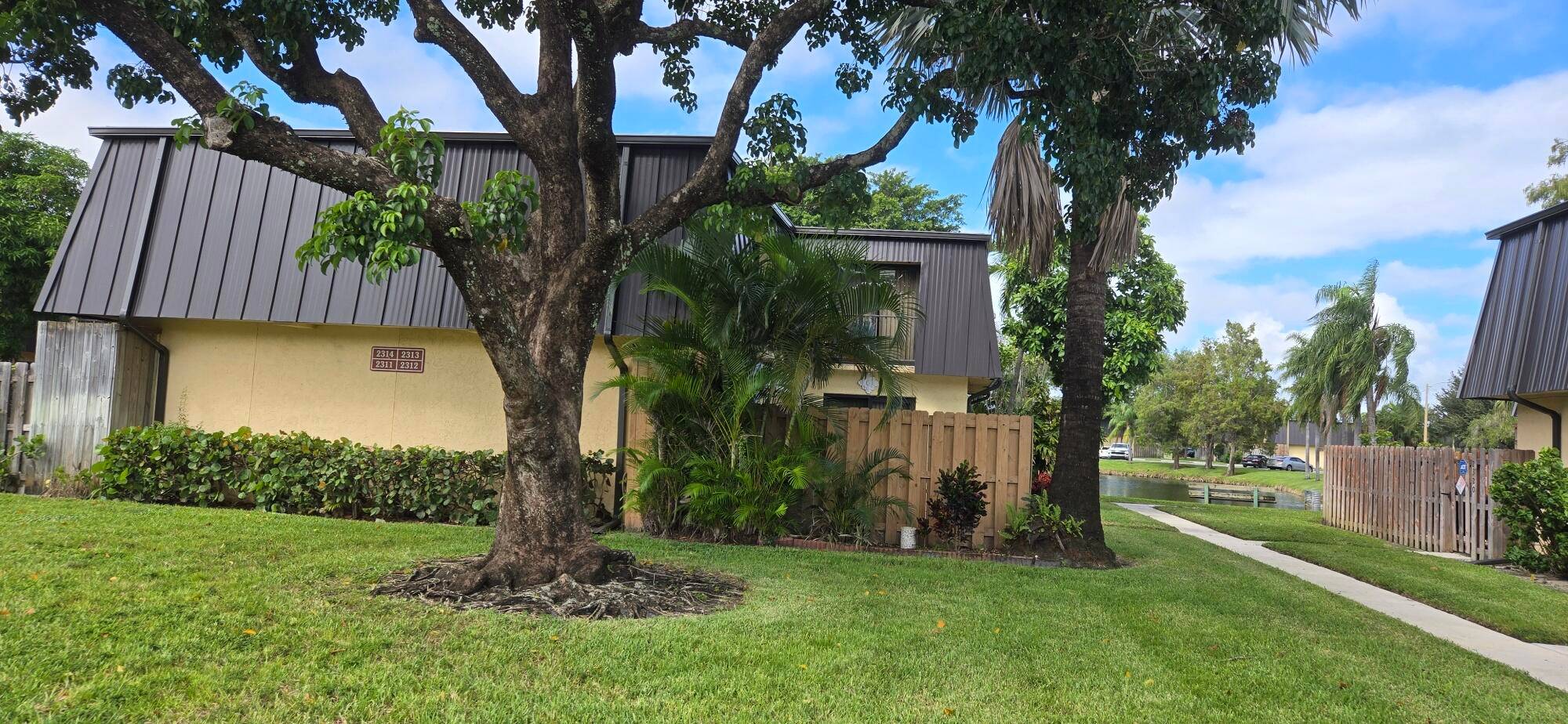 Two bedroom, Two full and one 1 2 bath, 2 story townhome in the desirable community of Waterside Estates.