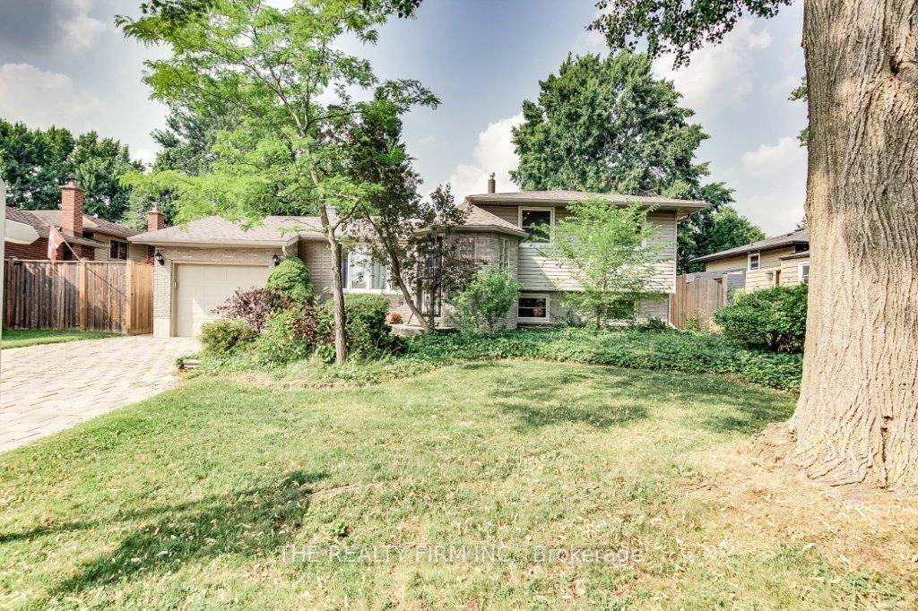 Larger than it looks ! This light filled 4 level side split has everything you are looking for.