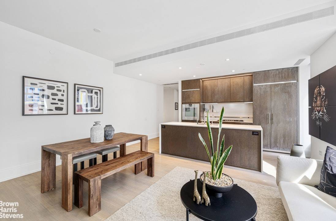 This double corner unit spans 1, 447 square feet, featuring two bedrooms and two and a half baths.