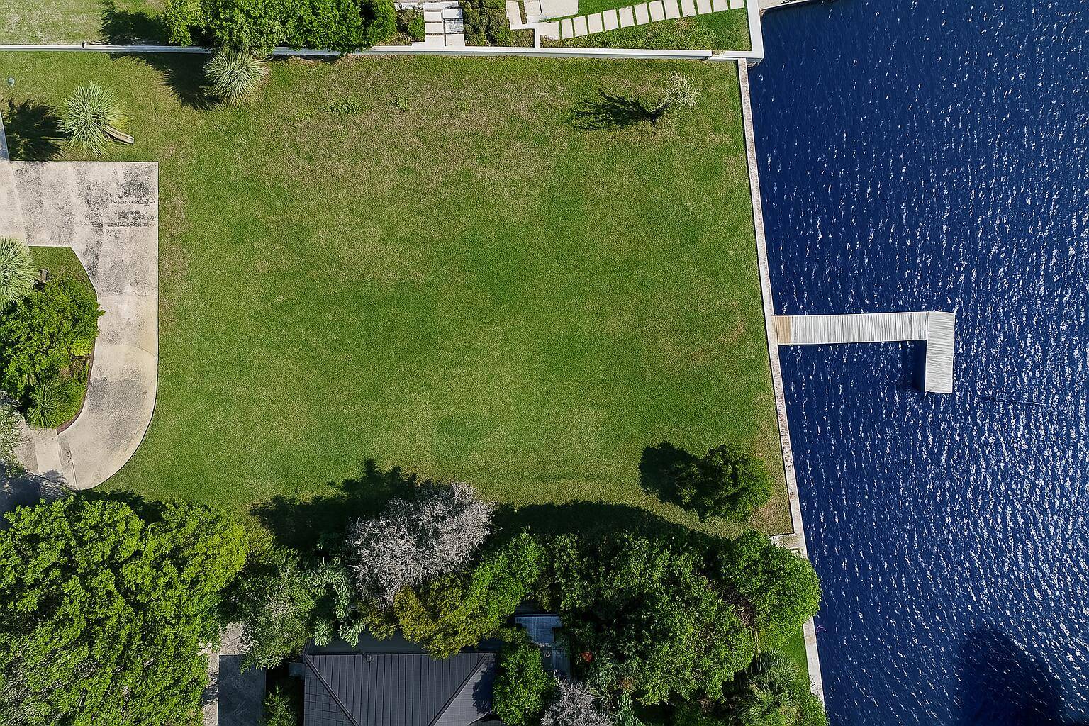 Incredible opportunity to build your dream waterfront estate on 100 feet of direct Intracoastal frontage in the prestigious College Park neighborhood of Lake Worth Beach.