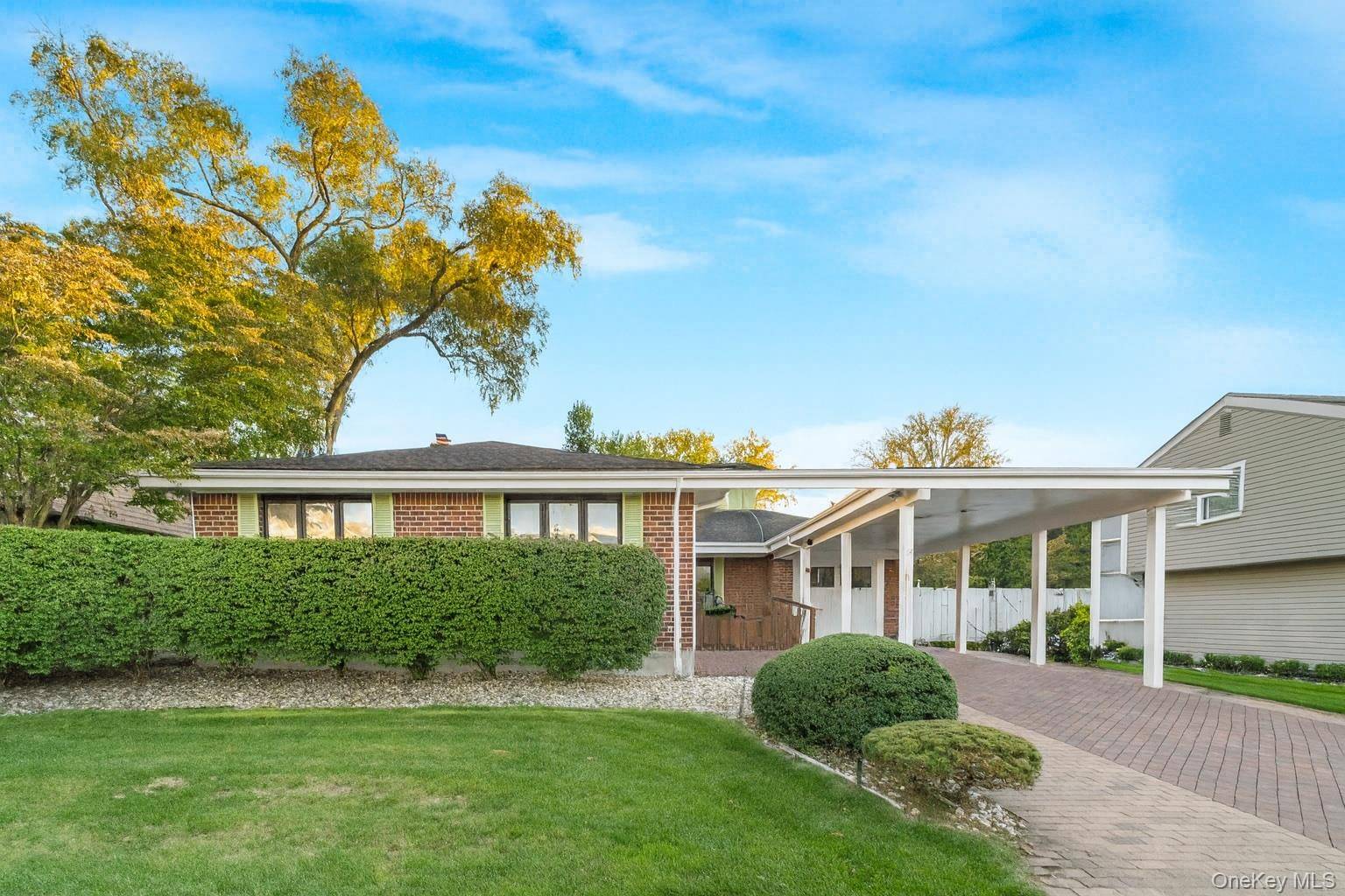 Distinctive mid century, split level residence blending warmth, character, and thoughtful updates throughout.