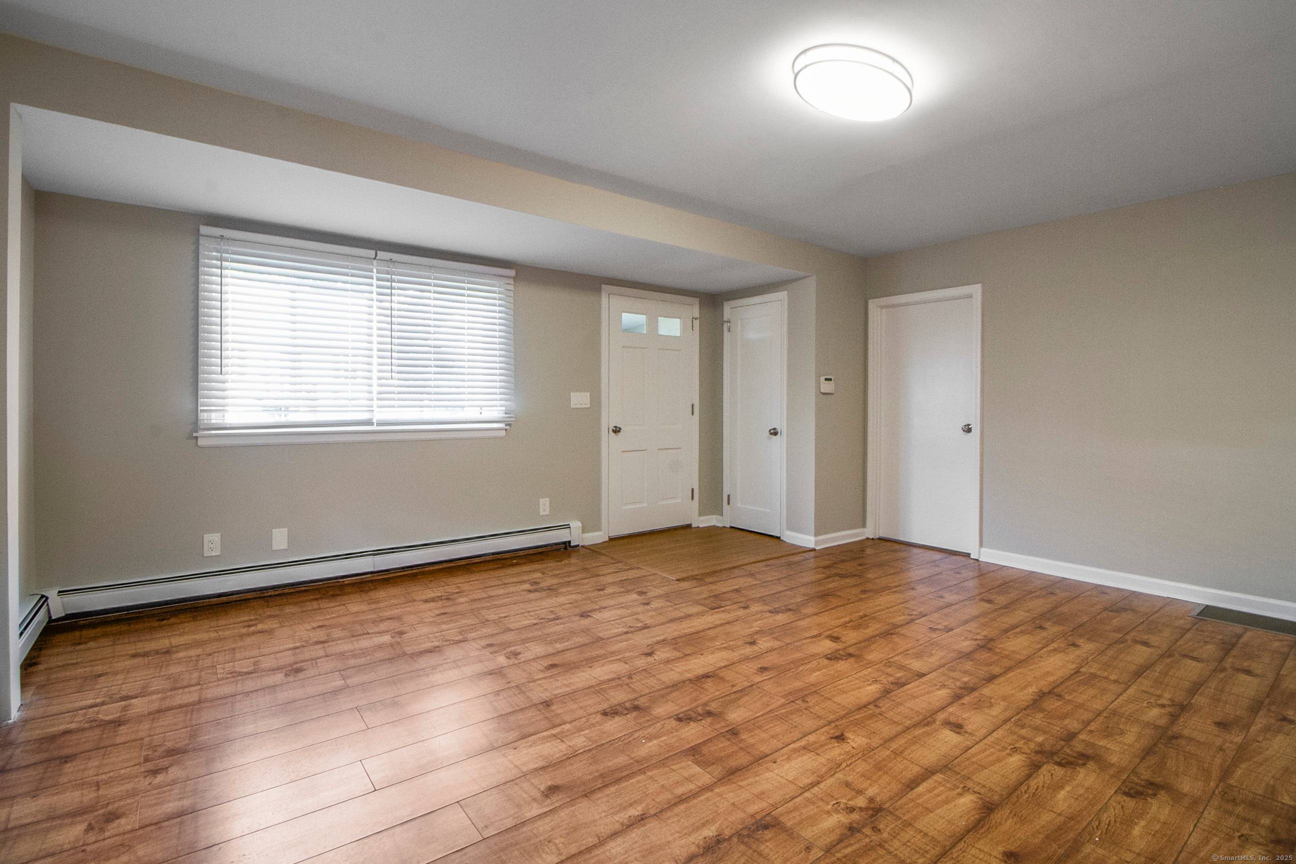 Beautifully remodeled Cape located in the North End of Bridgeport, close to Sacred Heart University and Main Street.