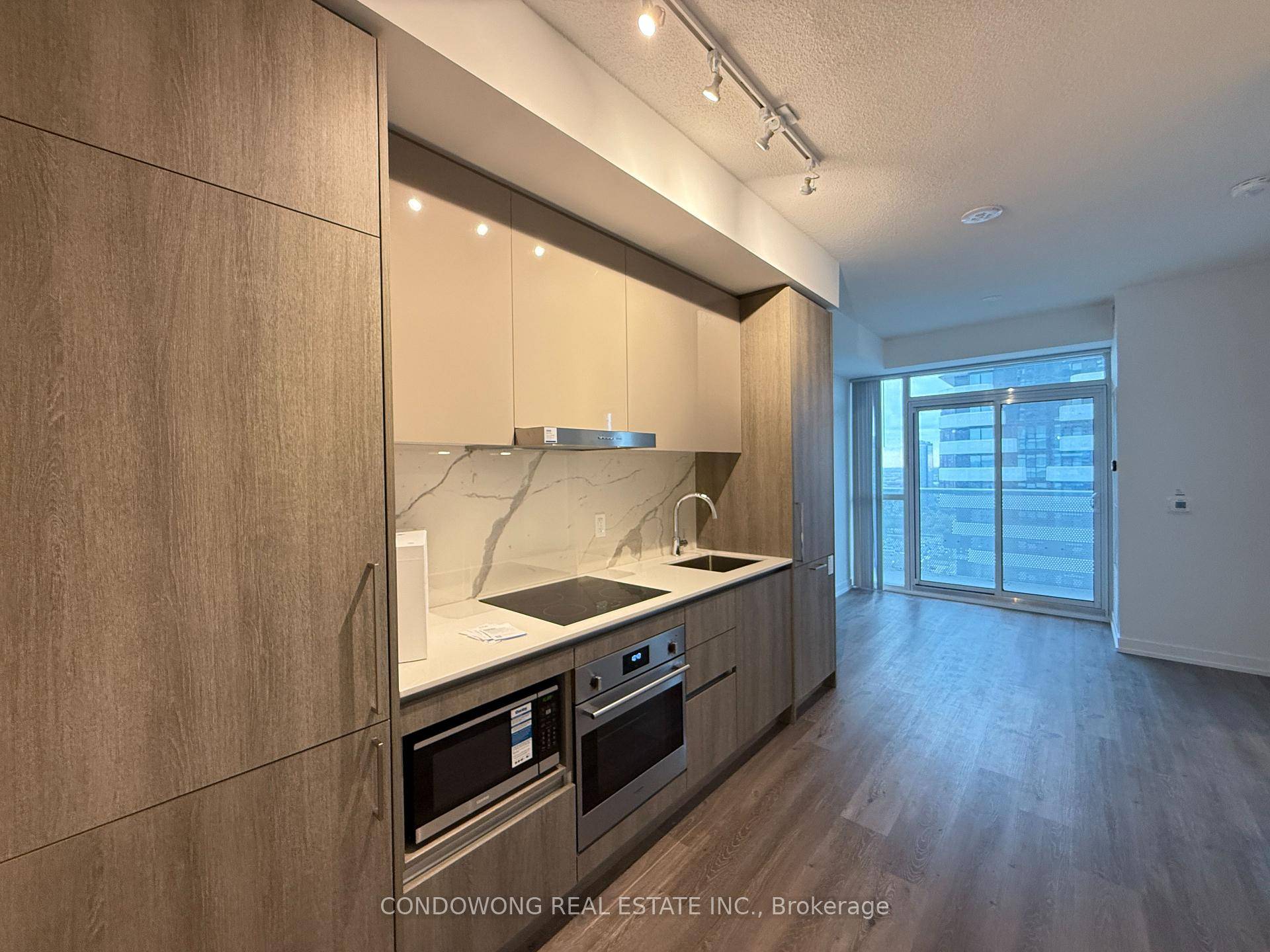 Step into this stylish 1 Bedroom Den, 2 Bathroom suite at Festival Tower, Vaughan's most sought after community.