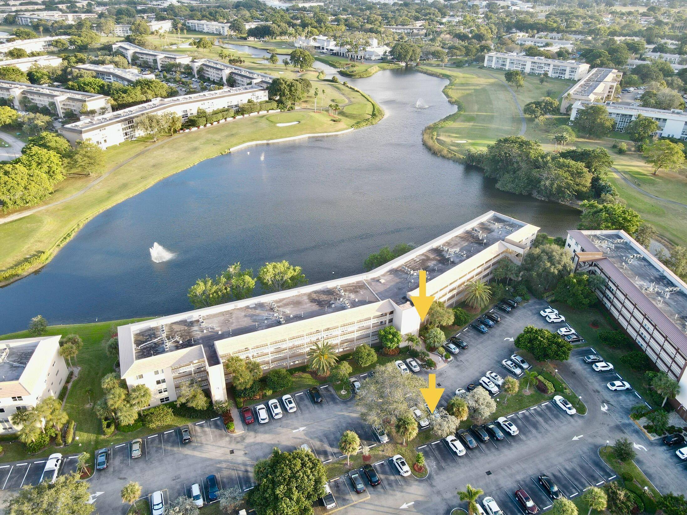 REDUCED TO SELL NOW ! 2 2 CONDO NESTLED ON THE WATER WITH LIGHTED FOUNTAIN GOLF VIEWS !