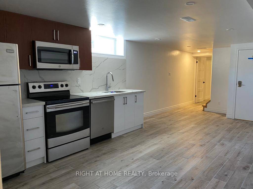 Fully Renovated 2 Bedroom Basement Apartment, with a Modern Kitchen, Stainless Steel Appliances, Built in Microwave and Dishwasher.