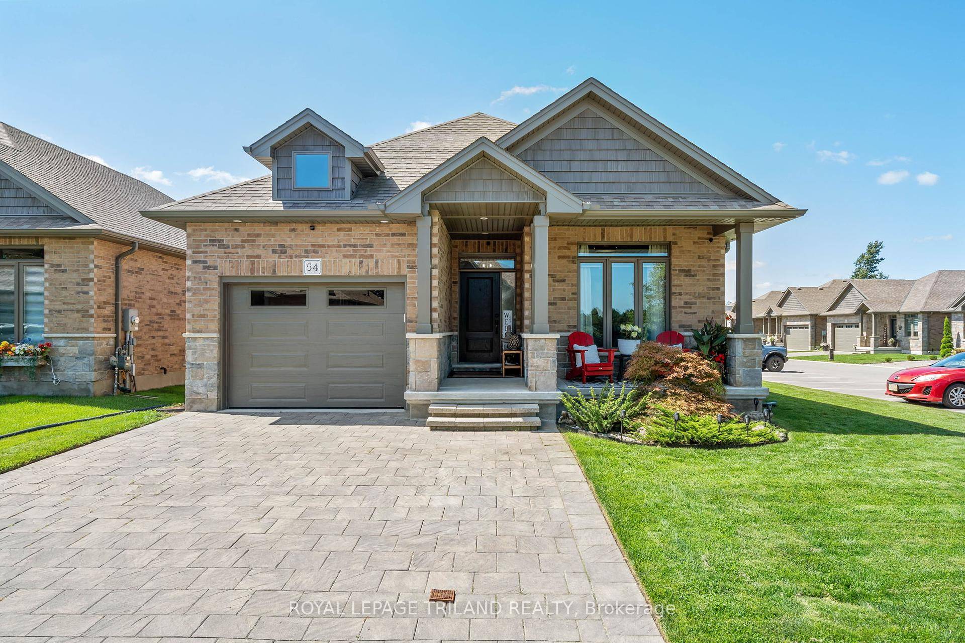 Welcome to 54 159 Collins Way, an elegant 3 bedroom bungalow nestled in the Caradoc Sands Golf Course community of vacant land condos.