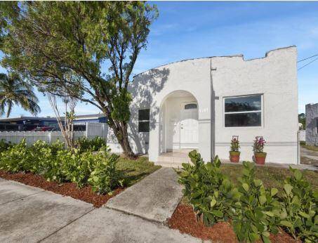 Renovated 3 2 home with newer roof, newer AC and impact glass.