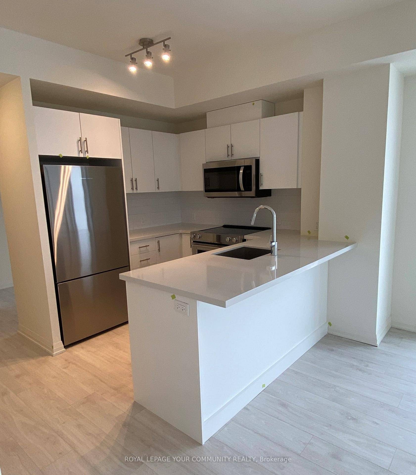 Brand new, bright and modern 690sq.