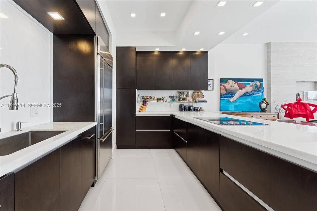 Experience luxury living in this fully remodeled 3 bedroom, 2 bathroom, 1945 SQFT penthouse on prestigious Williams Island, with the option for a third bedroom as an office or den.