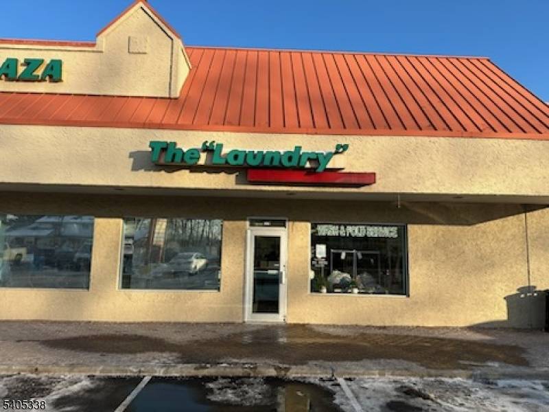 Quarter operated launderette with a drop off service, a clean environment, and friendly staff.