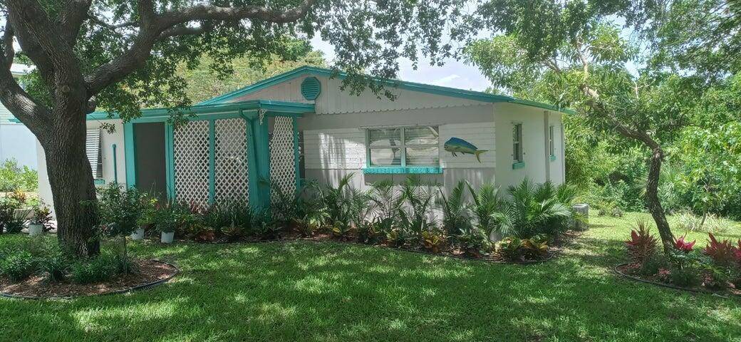 THIS REMODELED 3 2 HOME IS MINUTES FROM THE OCEAN AND NESTLED AMONG GORGEOUS HUGE OAKS POINCIANA TREE IN THE BACK YARD WITH PLENTY OF ROOM FOR A POOL IN ...