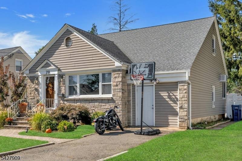 Welcome to your dream residence, nestled on a peaceful, tree lined street in a charming neighborhood.
