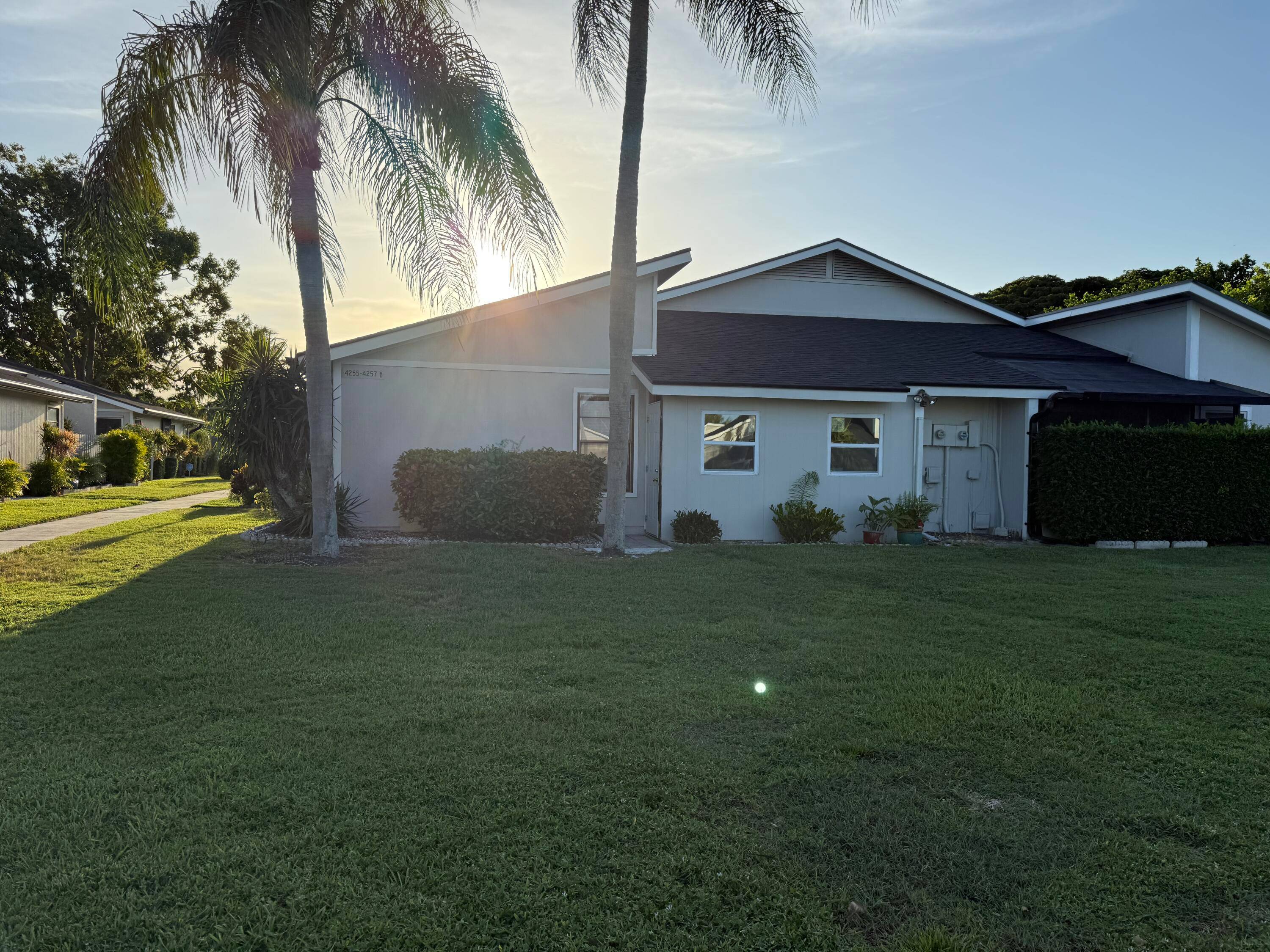 Beautiful one story villa with fresh exterior paint and a new roof in 2025.