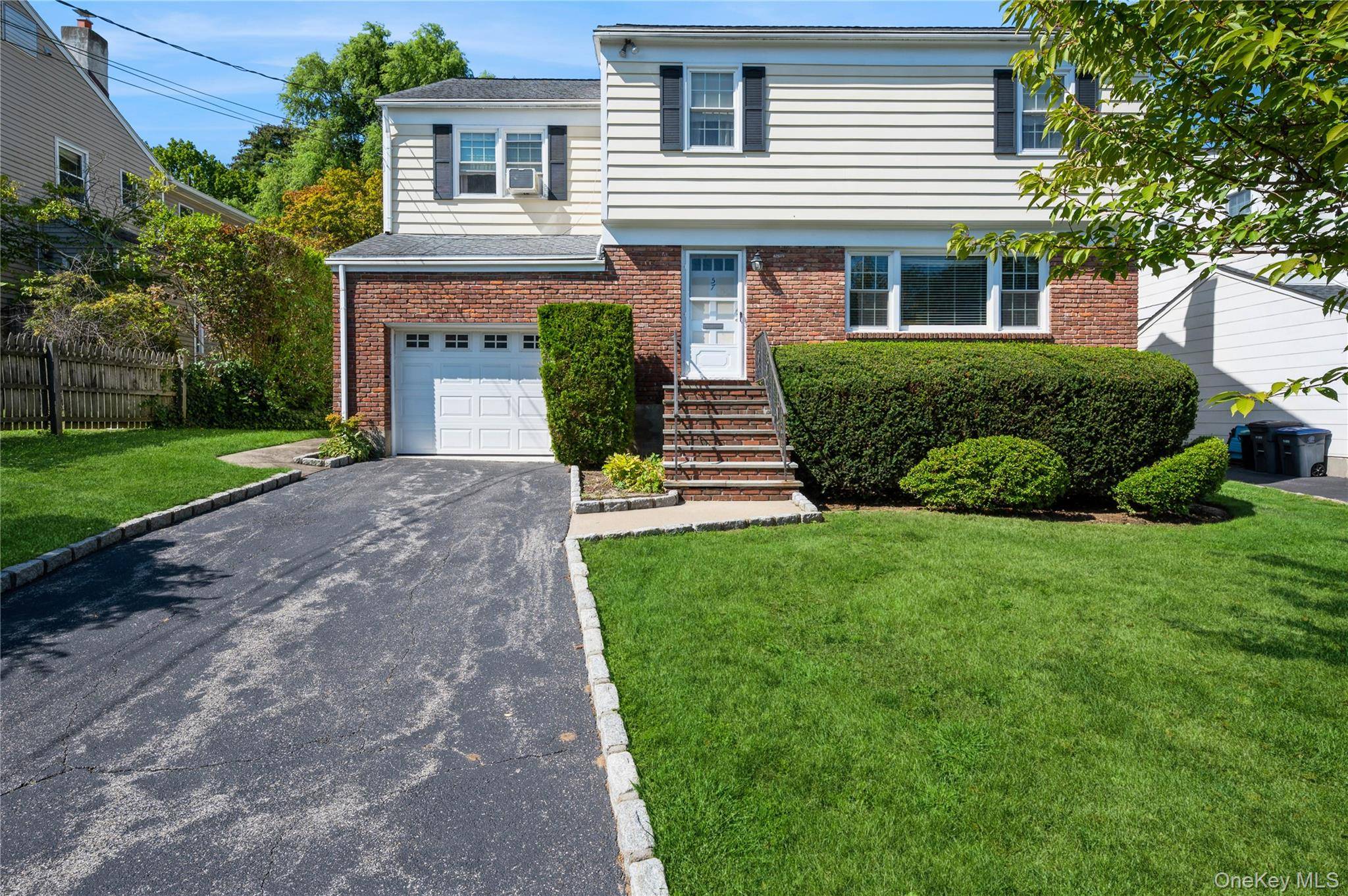 This spacious 4 bedroom side colonial combines classic design with modern practicality, offering a flexible layout that meets a variety of needs.