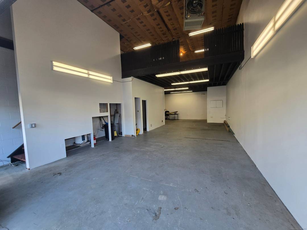 This exceptional end unit industrial loft at 130 Lenox Avenue in Stamford, Connecticut, offers a versatile space featuring open floor space and a loft, ideal for a wide range of ...