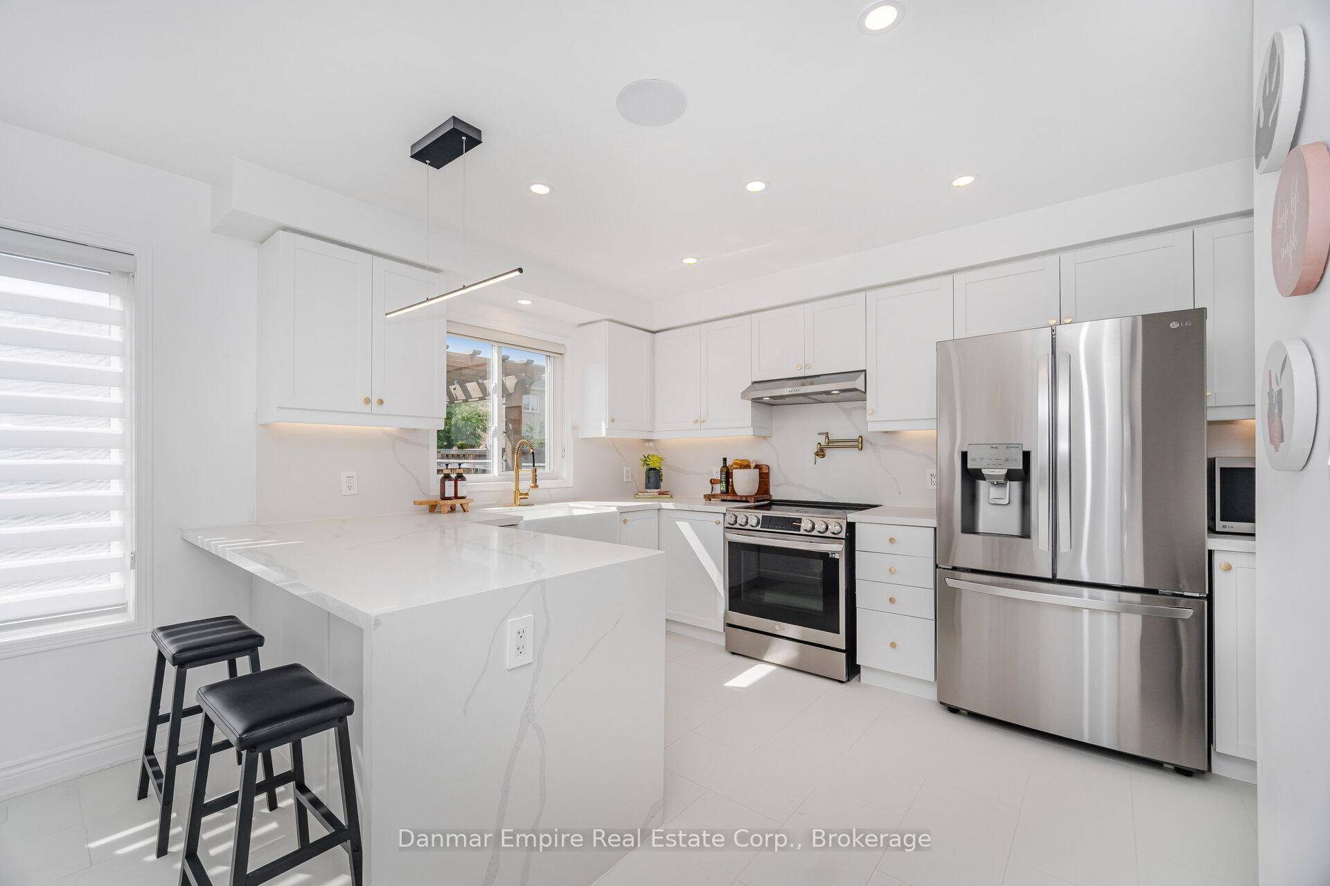 Timeless renovated residence, thoughtfully upgraded with top of the line finishes throughout.