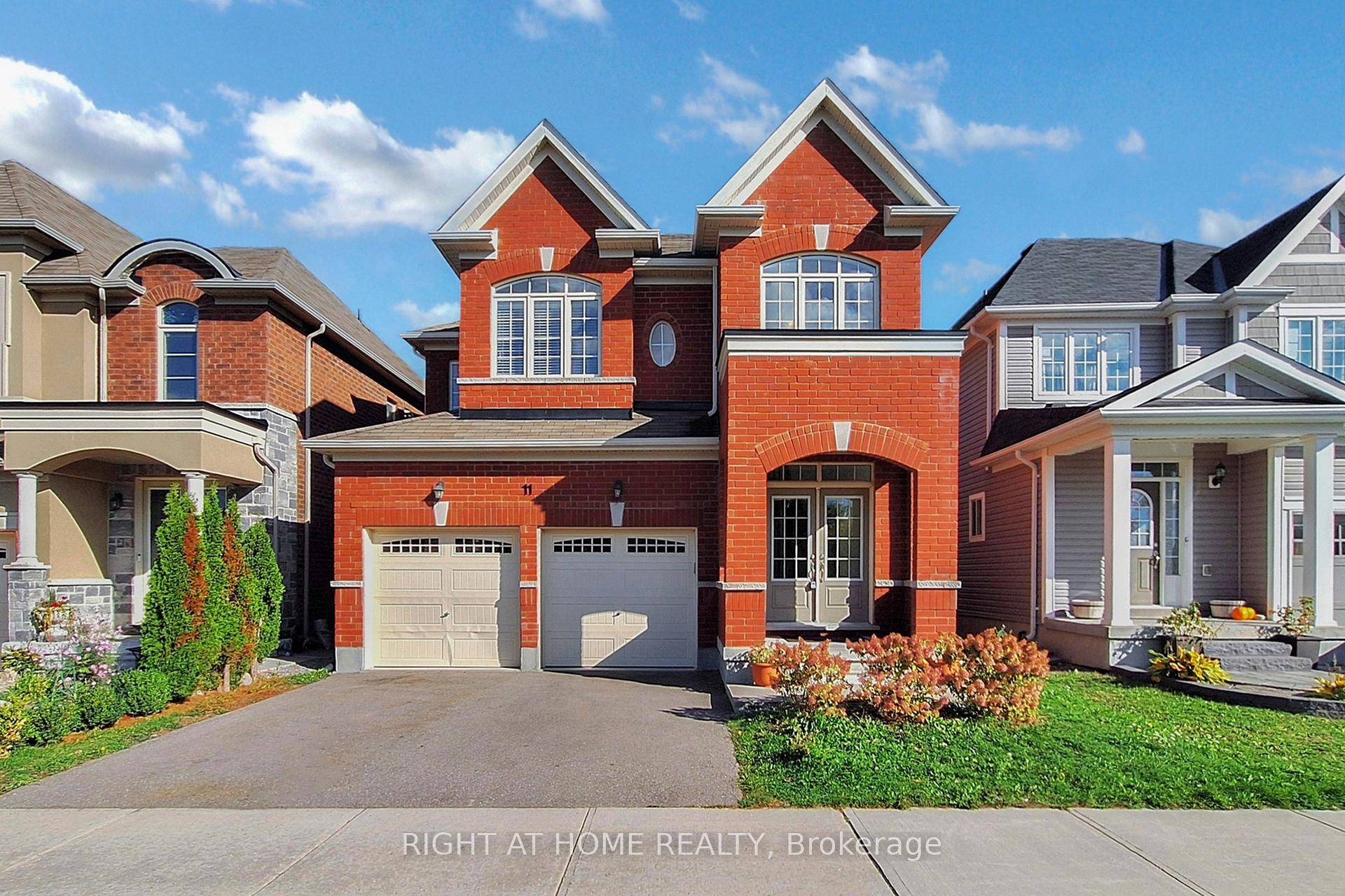 Welcome to this stunning 4 bedroom, 4 bathroom detached all brick home in the heart of Georgina.