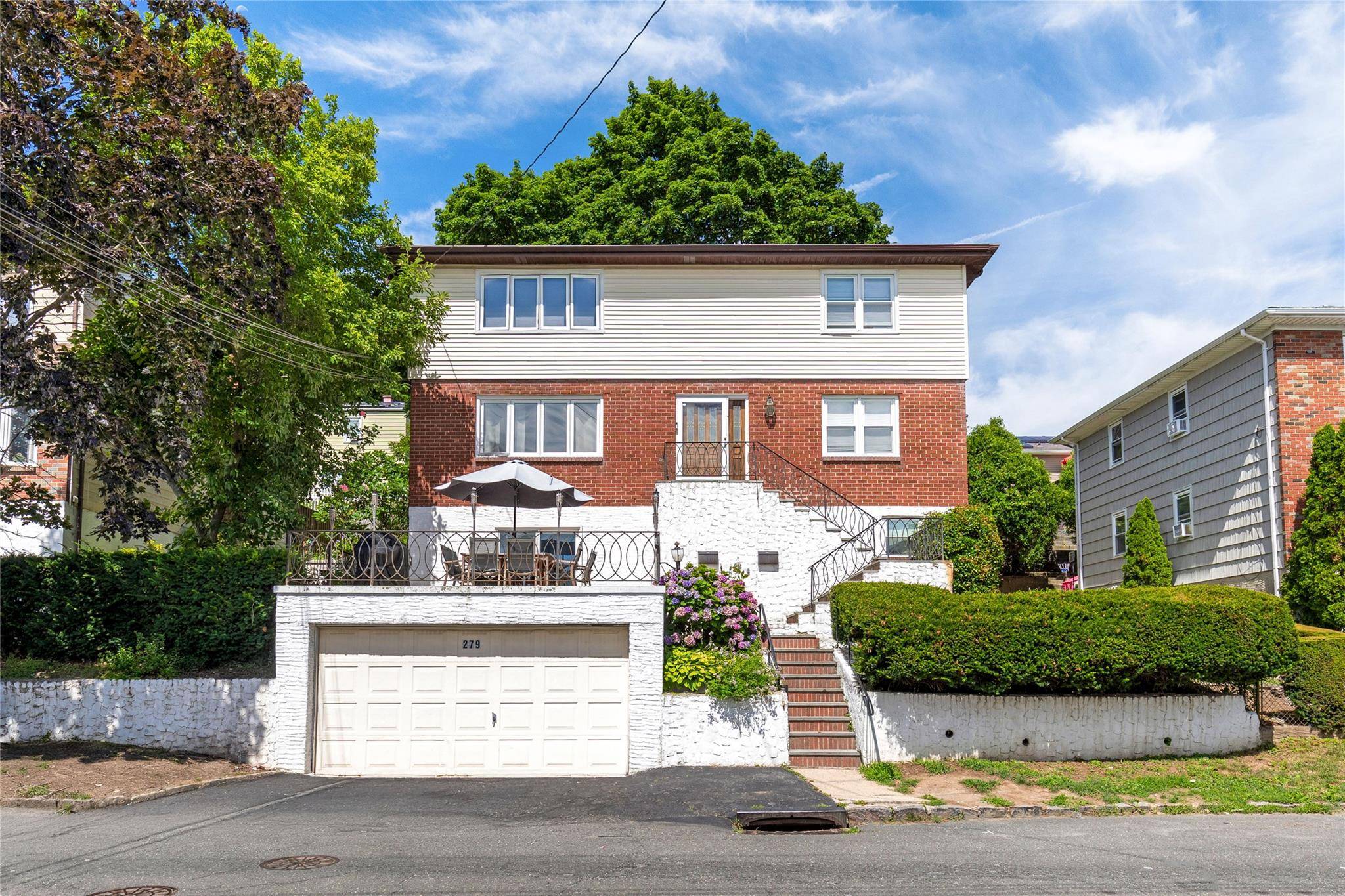 Rare Legal 2 Family Home with Legal In Law Suite Fully Detached Brick Gem in Yonkers !