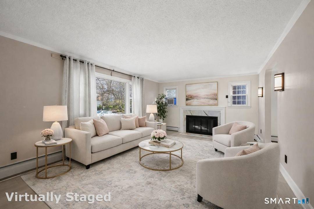 Welcome to 11 Lawler Road, a stunningly reimagined home where modern luxury meets an unbeatable West Hartford location.