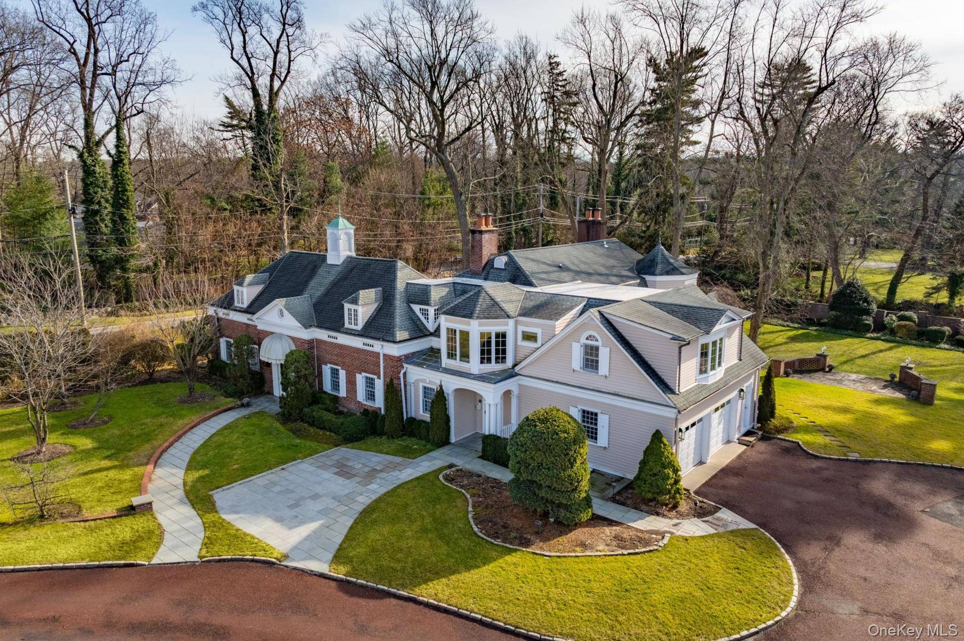 Welcome to an extraordinary opportunity to lease this stately and timeless home in the heart of Roslyn Harbor.