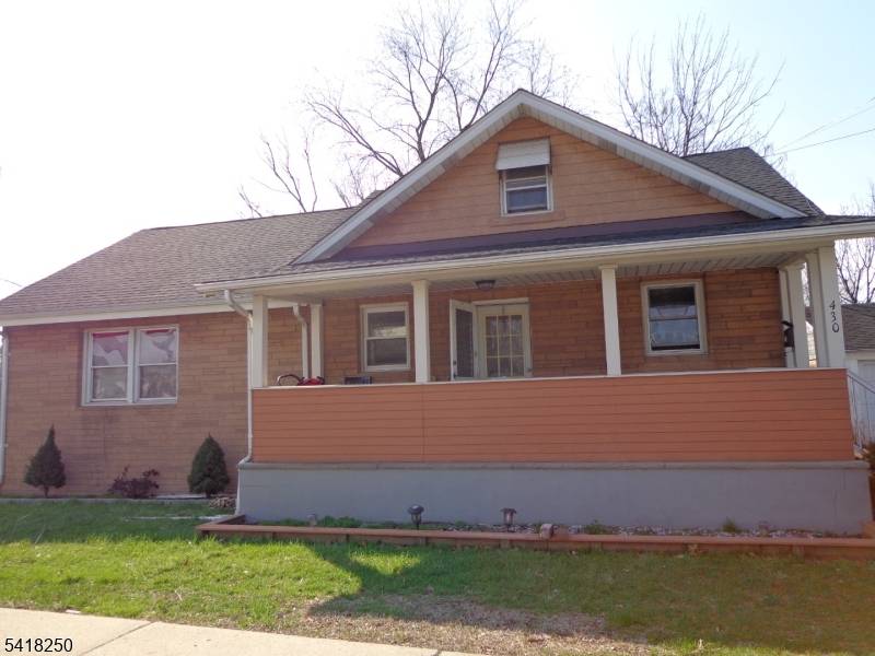 Great house with updates, open front porch, large walk up attic and finish basement with a full bath