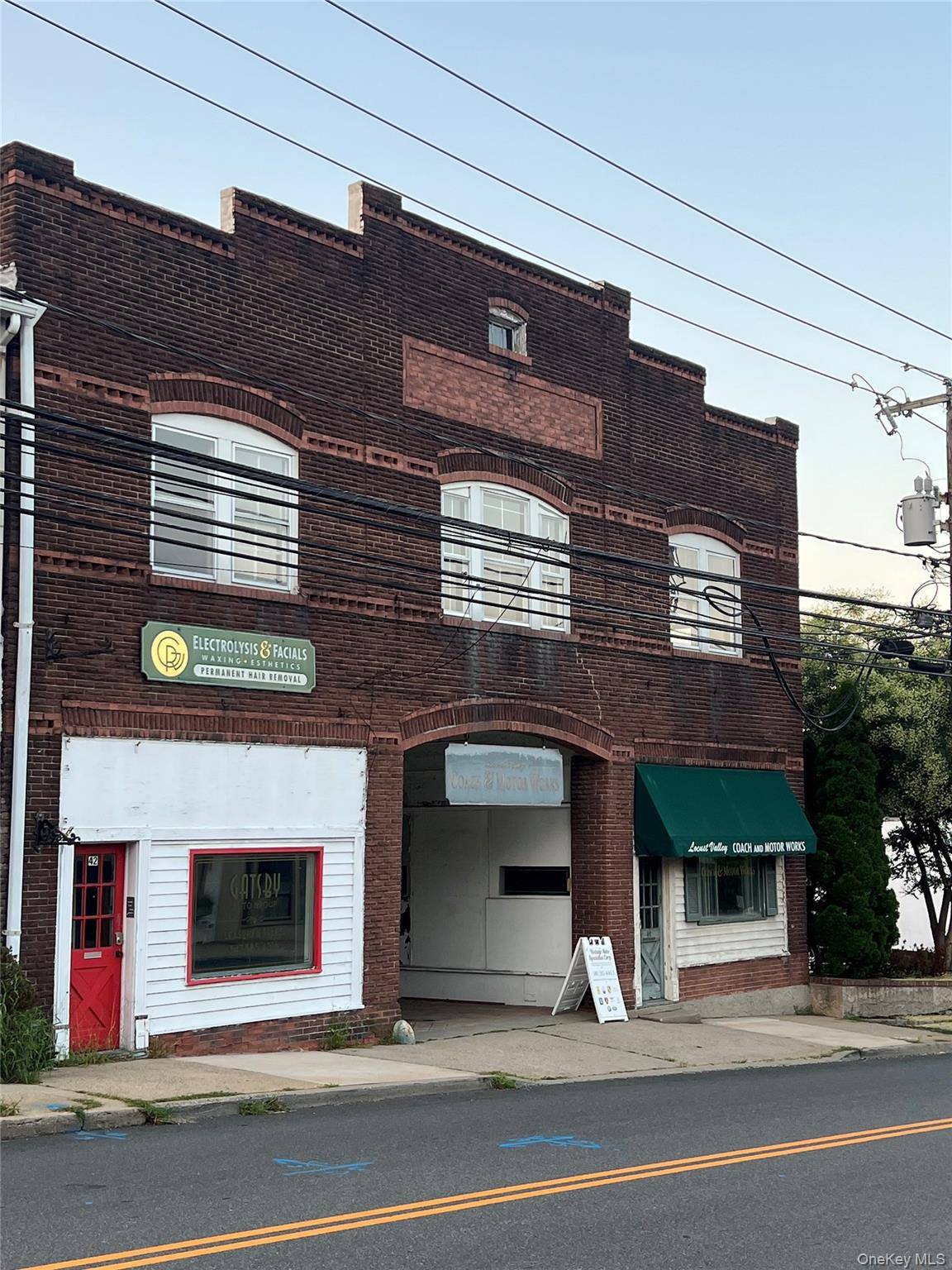 Own a piece of history in the center of Locust Valley, 11, 000 sft building, brick construction, new roof and gutters.