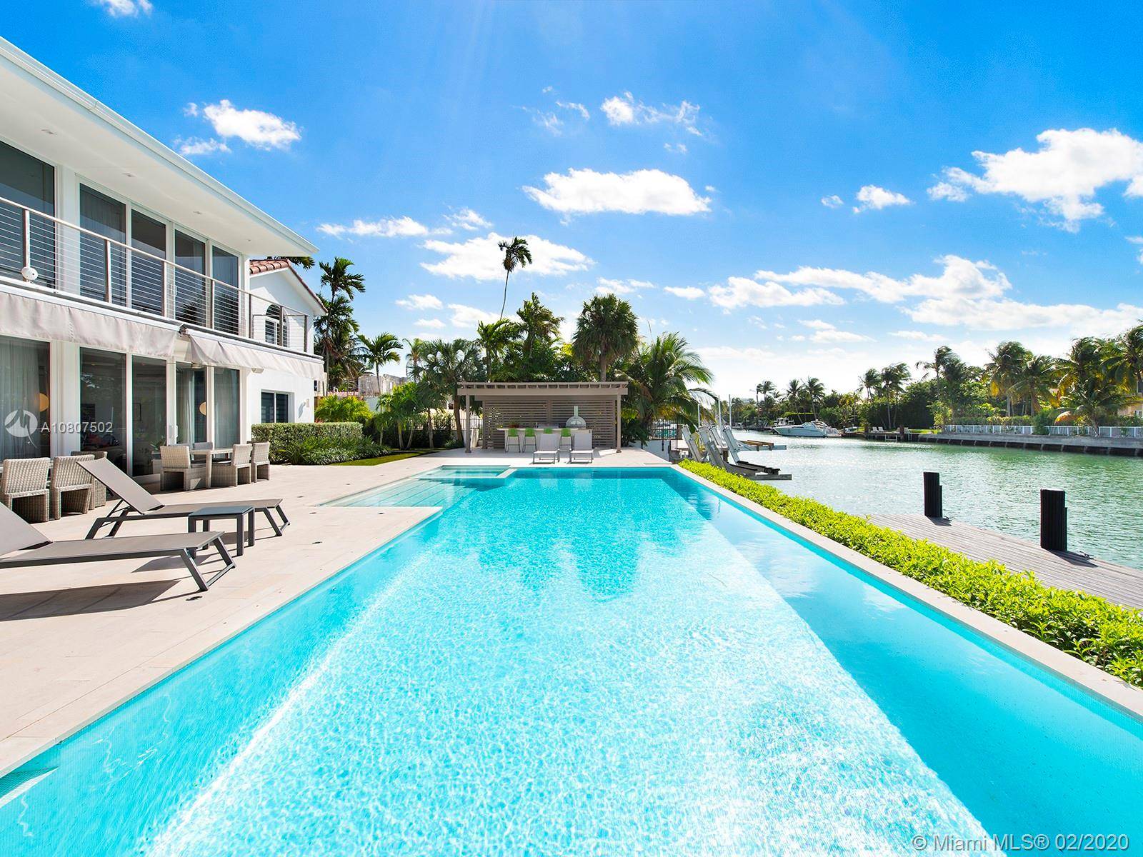 Recognized as a rare jewel in Miami Beach, this two story historic estate sits on a 24, 064 SF double lot with 128 ft of waterfront.