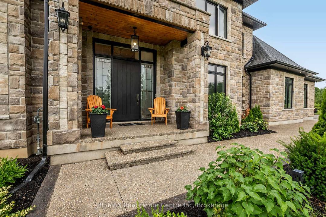 Custom Luxury Estate 7645 Maltby Rd E, A truly exceptional custom built set on private lot spanning over 2 acres in one of Puslinch most prestigious communities.