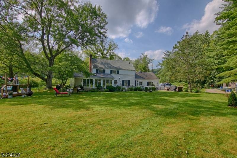 Picturesque Colonial home residing on 9.
