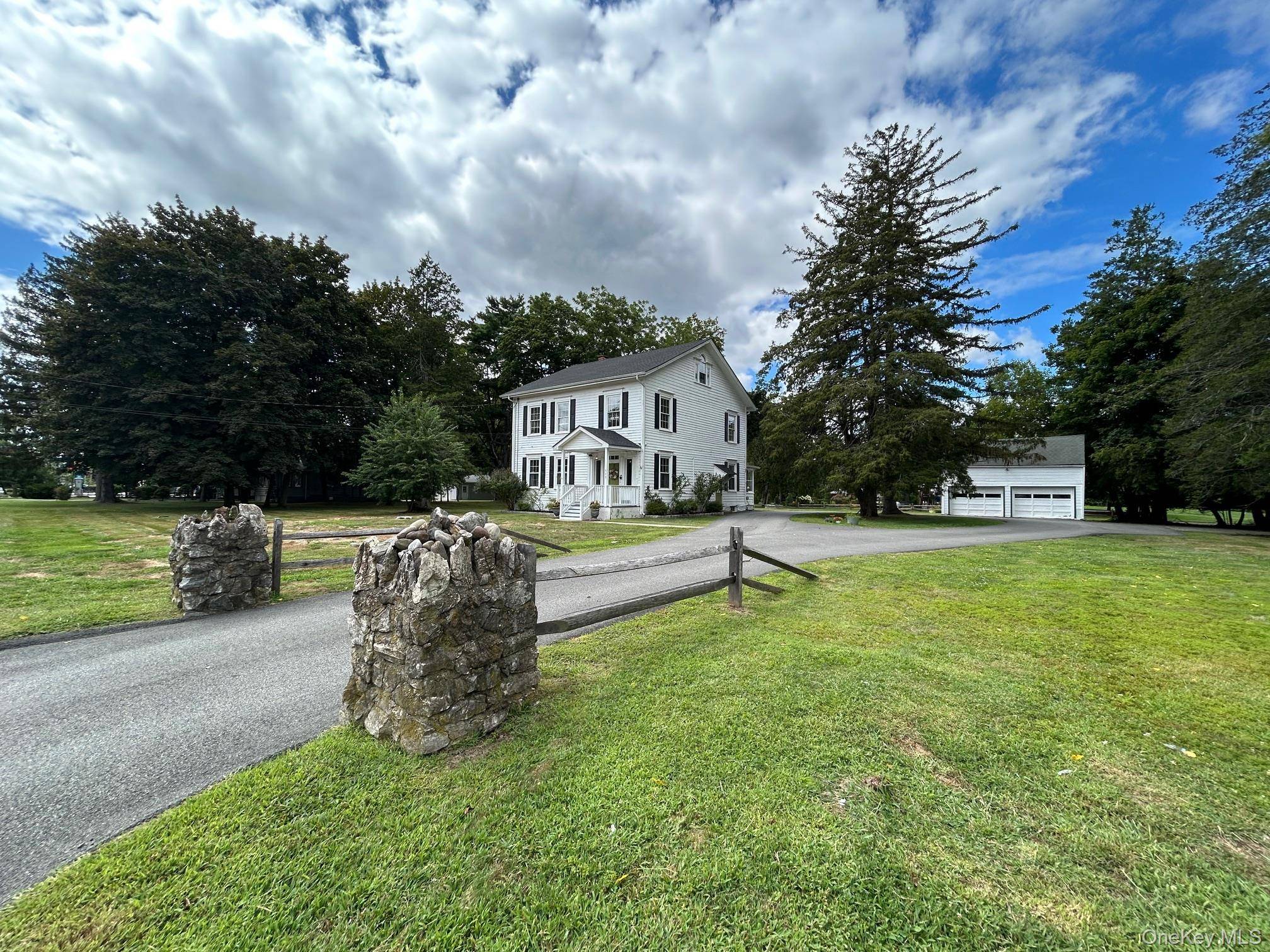 Welcome to this stately 1800's Colonial style home offering a huge amount of space on 1.