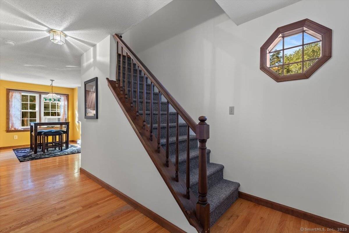 This classic Cape Cod home offers warmth and functionality throughout.